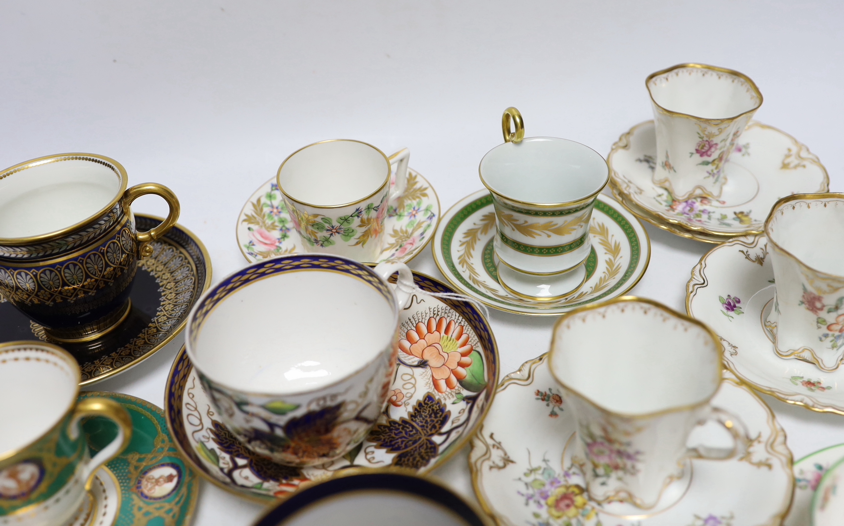 A group of 19th century and later cups and saucers including a Royal Yacht example